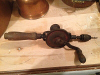 Old drill with crank wheel