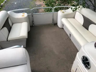 Pontoon boat with Yamaha 70 HP and 2009 National Trailer. Very clean condition!