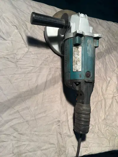 7” MAKITA GRINDER, View more