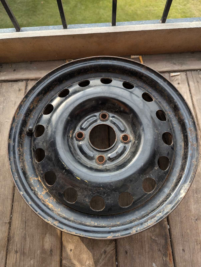 Four 15 inch 4 bolt rims and tires in Tires & Rims in Saskatoon