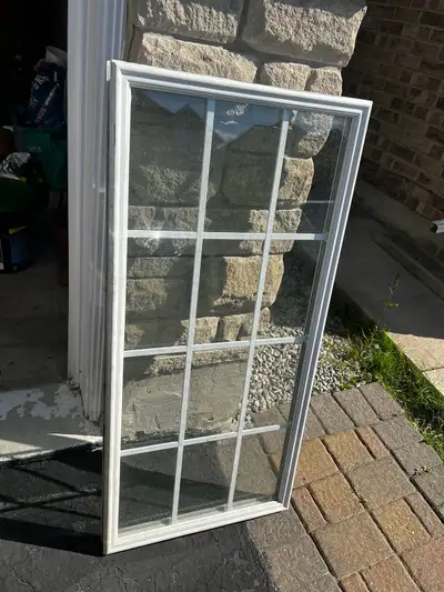 24 x 50 Inches Glass Window Insert. Pickup near Gore Rd and Castle Oaks Crossing in Brampton. Price...