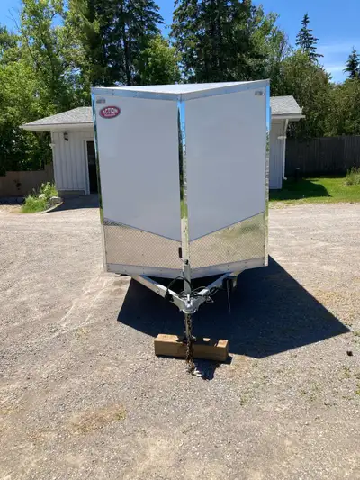 Action trailer. All aluminum 6 foot wide by 14 foot long by 6 foot clear inside height 2 barn door a...