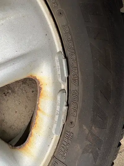 Bridgestone Blizzacks 4 rims and tires. 225/65 R17. Had on 2011 Toyota Sienna. Steel rims from Toyot...