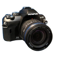 Olympus E-410 DSLR camera with Roots bag and 2 memory card