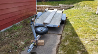 4.5 x 10 ft single flat bed skidoo trailer.