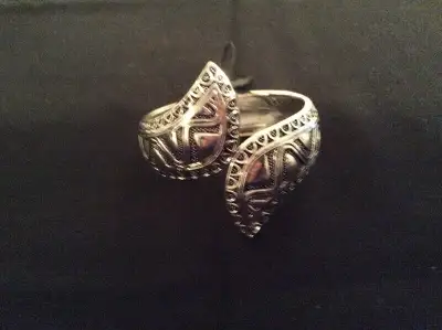 Silver colour metal cuff bracelet with spring closure. EXPRESSION costume jewelry. NEVER WORN, tag s...