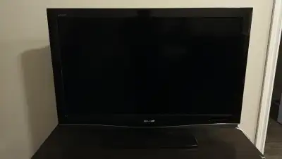 Sharp 42” LCD TV with remote control, View more