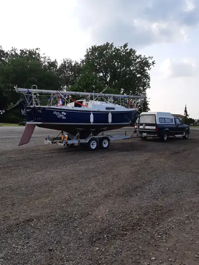 C & C 25 ' Redline Sailboat on trailer, View more