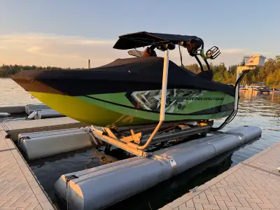 I'm selling my used 2015 Nautique G23 with approximately 400 hours, known for its exceptional wakebo...