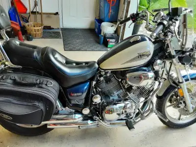 Beautiful Virago 1100, runs well looks good. Has high removable windshield, wind deflectors, throttl...
