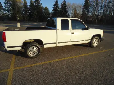 Classic '95 Chevy Silverado. Original kms.. 5.7L engine. Spray-in box liner. New tires. Not winter d...