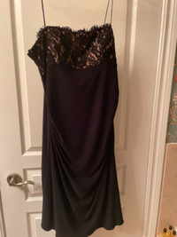 Black cocktail dress with lace bodice. Size 14.