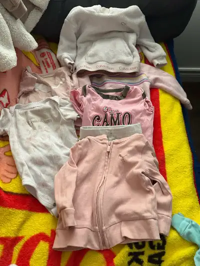 I have a tote full of some newborn, 0-3 months and 3-6 months Nike, puma, roots, Jordan n others Som...