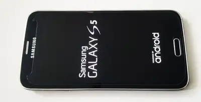 Samsung Galaxy S5 in pristine condition. It comes in original box along with wall charger and USB ca...