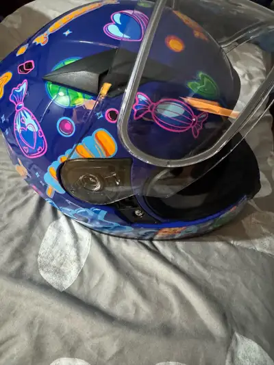Brand new Ckx youth helmet. Never used. Tried on once then a year later was too small. Very neat gra...