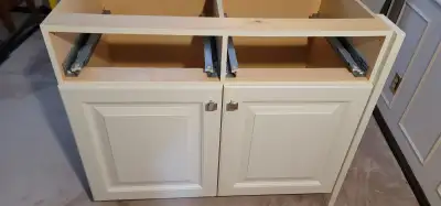 White base cabinet with 2 doors and drawer slides $125, View more