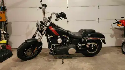 Very well maintained 2014 Harley-Davidson Fat Bob 103ci 8661 original km's and going up I have a vid...