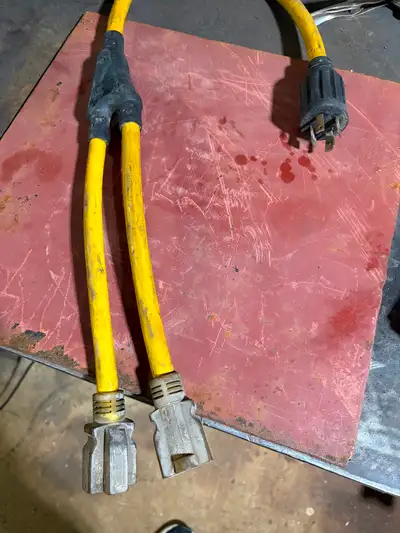 I have a locking generator plug to double household ends for sale , first $15 takes it.