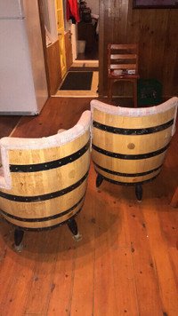 2 antique wheel barrel chairs