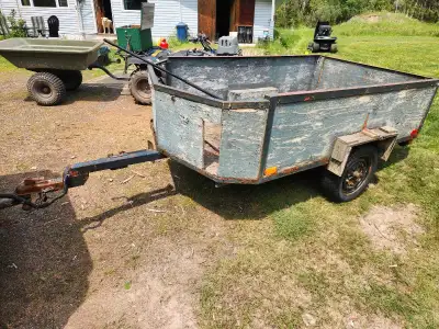 Trailer for sale. Good tires and lights work. Could use some new wood. Have ownership.