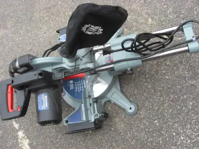 10 in. compound sl mitre saw with blade. Nearly new. King Canada, View more