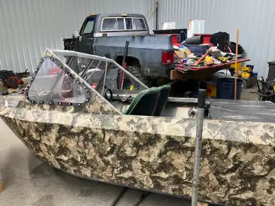 Mini jet boat 12 ft gas dents dings and scratches and could use a finishing touch i ve put 40 hours...