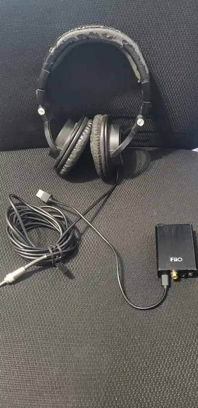 Fiio Olympus 2 and Audio Technica ath m50. Dac is like new. Phones show their age but still sound gr...