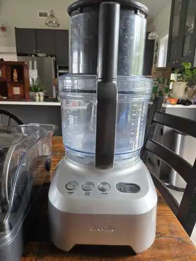 This is a Breville food processor with a large capacity bowl and multiple blades for slicing, dicing...