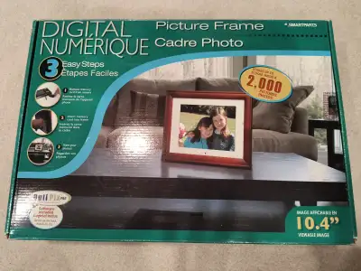 For sale is a like-new SmartParts brand 10.4" digital picture frame with all original accessories. F...