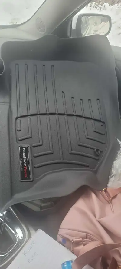 Heavy-duty, laser-molded design with raised edges to trap dirt, mud, snow, and spills. Much better p...