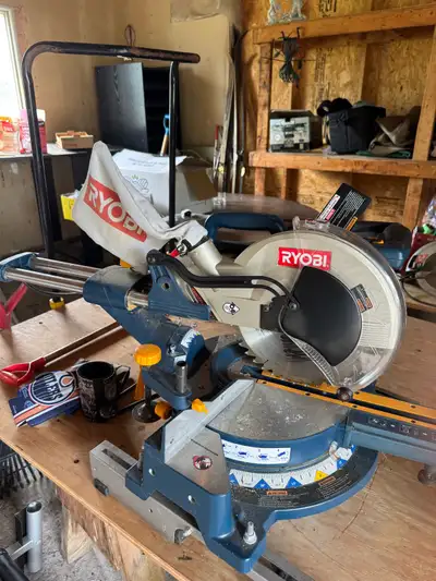 Ryobi TSS101L 10” sliding compound miter saw * Stand * Original blade * Work supports/clamp and acce...