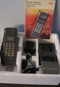 1980s NEC Portable Brick Cellular Telephone And Accessories
