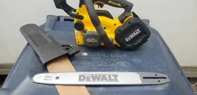 This brand new Dewalt 60V top handle chainsaw with a 14-inch bar is ready to tackle any cutting task...