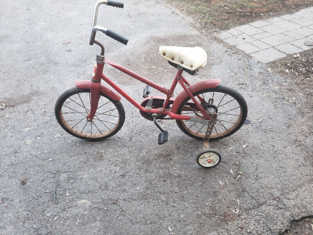 Red Vintage Tonka  Hedstrom Child Bicycle  training wheel in Kids in Ottawa