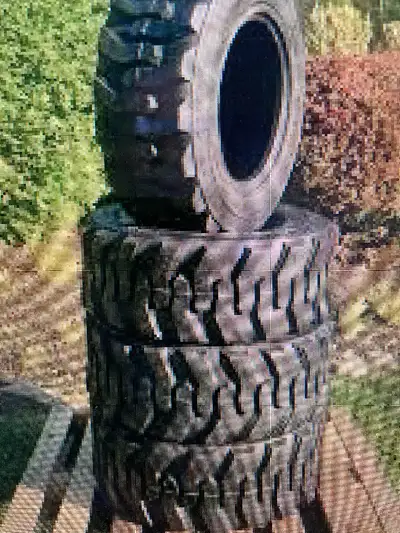 12 PLY 4 NEW TIRES 12 X16.5 SKIDSTEER OR FRONT BACKHOE CALL 5064613657 PRICE FOR ALL 4 $ 1600 PLUS T...
