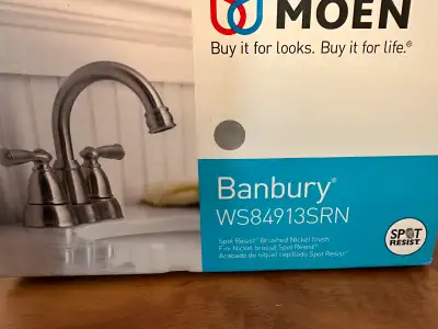 Elevate your space with the Moen Banbury WS84913SRN, a sleek two-handle faucet in Spot Resist™ Brush...