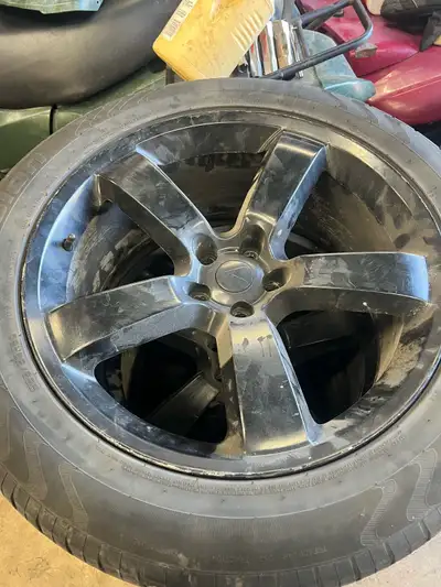 265-50-20 tires and rims 5x114.3 or 5x115 not sure the rims was on a 2014 Chrysler 300 rwd should fi...