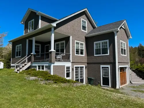Overlooking the picturesque French Village Harbour, this executive home offers unparalleled views an...