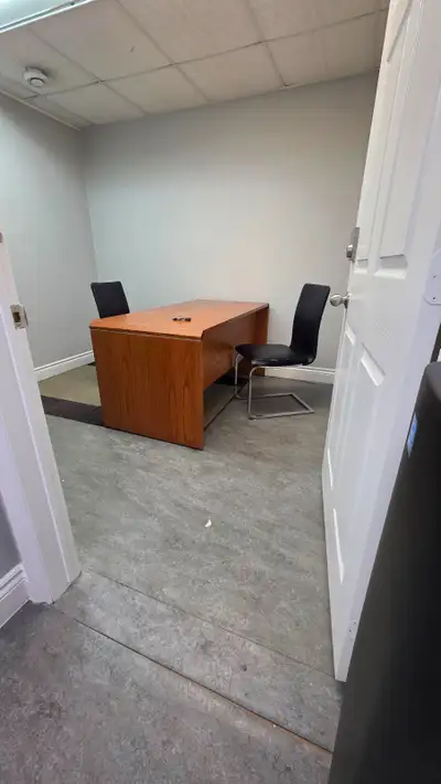 This is a private office on the upper level with a shared reception area. You have a private office...