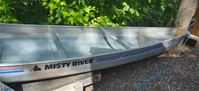 Misty River 16 ft square back Canoe Excellent condition. Includes two Paddles and two life jackets....