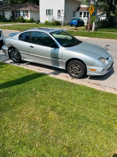 Selling my 2001 Pontiac Sunfire parts car interior in good shape two new tires front fenders no rust...