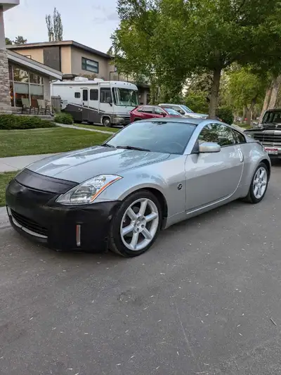 Selling my 2005 Nissan 350Z, a sleek silver coupe with manual transmission, perfect for those who lo...