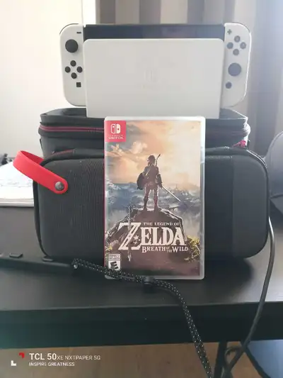 Nintendo switch oled avec Zelda breath of the wild, View more
