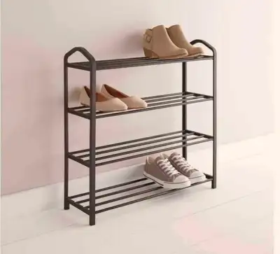 This metal shoe rack is perfect for keeping your entryway or closet organized with its four-tier des...