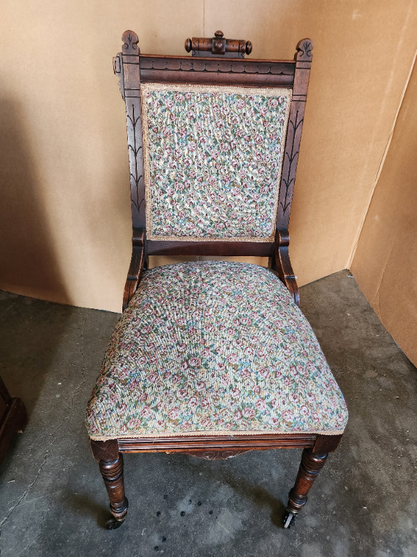 Antique chair with casters on front legs in Other in Belleville
