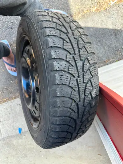 1 set of Four Hankook Winter Tires with wheels (Hardly used for 1.5 seasons) for sale. the size is 2...