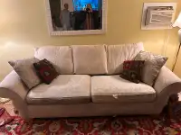 Free cream colored sofa.