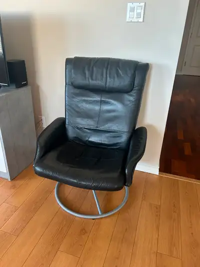High back swivel recliner in good condition for $50 call 825-440-9440