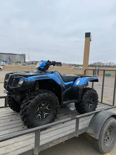 Honda rubicon 520 deluxe with only 1300kms. Has a winch, and upgraded tires. Heated handgrips and th...