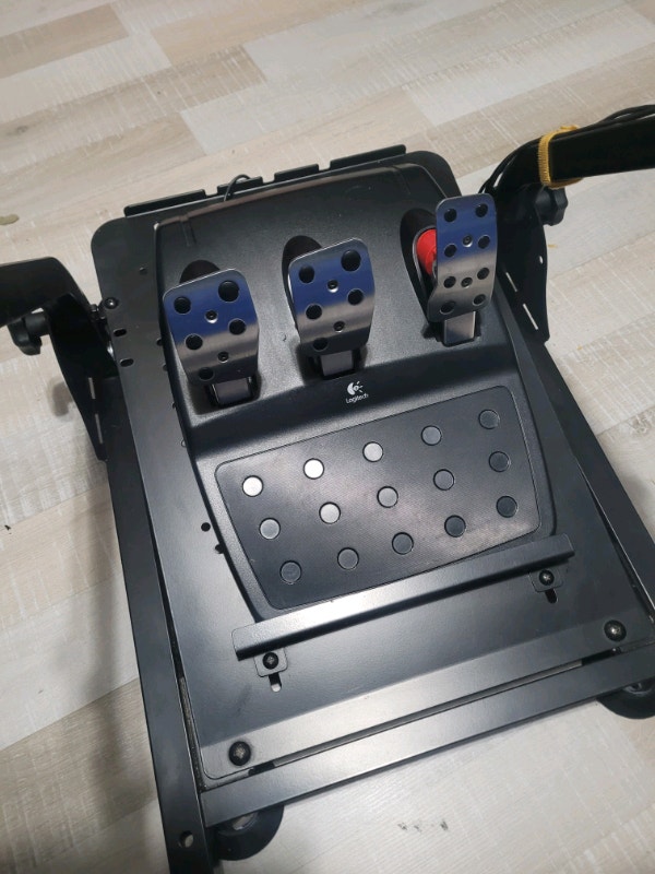 Logitech g27 racing wheel with a adjustable folding metal stand